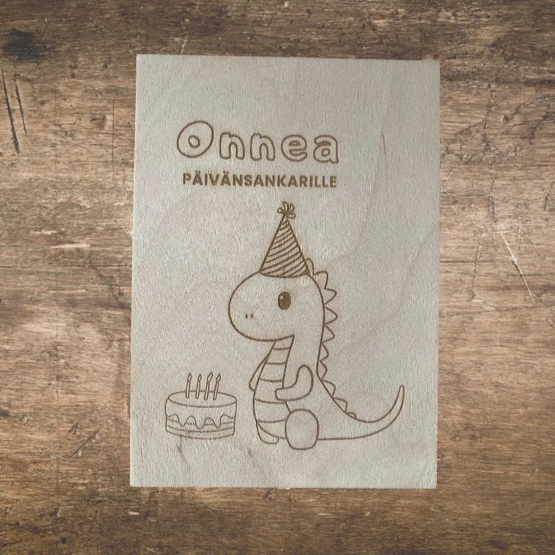 Puinen dinosaurus onnittelukortti sopii lasten syntymäpäiville.