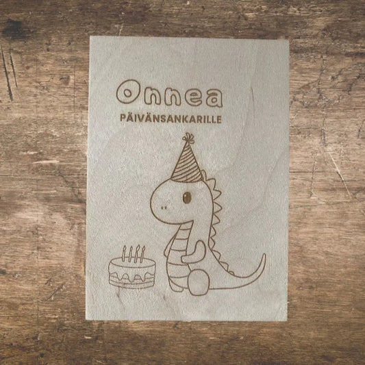 Puinen dinosaurus onnittelukortti sopii lasten syntymäpäiville.